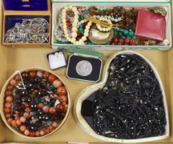 A collection of assorted jewellery, including French jet, banded agate and malachite beads, paste