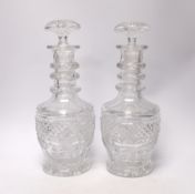 A pair of mid 19th century cut glass decanters and stoppers, 29cm