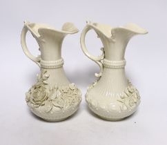 A pair of Belleek jugs with applied rose decoration, 19 cm high