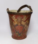 A 19th century red painted fire bucket decorated with royal crest, 32cm