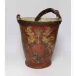 A 19th century red painted fire bucket decorated with royal crest, 32cm
