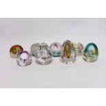 Eight limited edition Caithness glass paperweights, four with boxes