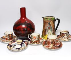 A Doulton flambé vase, a Gaffers Seriesware jug and Royal Crown Derby Imari cups and saucers,