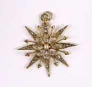 A yellow metal, rose cut diamond and seed pearl set starburst pendant, 27mm, gross weight 1.9