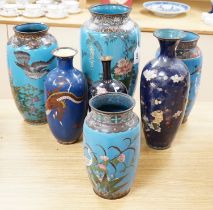 Seven Japanese cloisonné enamel vases, enamelled with dragons, flowers and birds, largest 40cm high