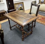 A 19th century Continental walnut side table and Flemish oak chair, table width 99cm, depth 65cm,