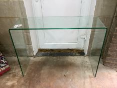 A Contemporary glass console table, width 99cm, depth 33cm, height 75cm