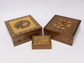 Three Tunbridgeware boxes, two decorated with perspective cube Marketree, the third with floral