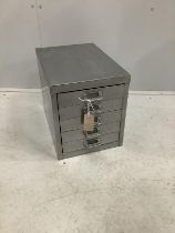 A polished steel five drawer filing chest, width 28cm, depth 41cm, height 33cm