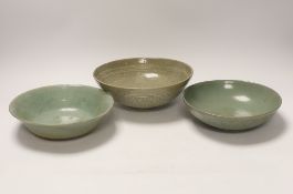 Two Korean celadon bowls, Goryeo dynasty (11th/12th century), the first carved with lotus petals