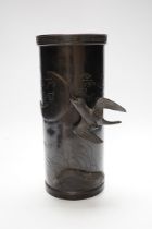 A Japanese bronze cylinder vase with applied bird, 28cm