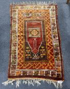 A Turkish prayer rug, 154 x 96cm