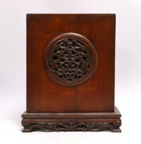 A Buddhist domestic carved hardwood shrine, 34cm high