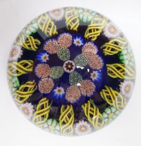 A Paul Ysart millefiori glass paperweight, pre-war Moncrieff period, with central complex canes