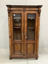A 19th century French glazed walnut bookcase, width 92cm, depth 42cm, height 156cm