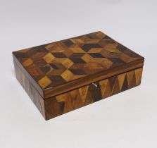 An early 19th century specimen wood perspective cube marquetry jewellery box, 27cm wide, 19.5cm