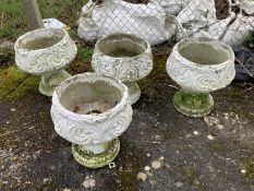 A set of four painted reconstituted stone garden urns, diameter 42cm, height 45cm