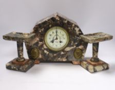 An early 20th century French marble clock garniture with key and pendulum, 25cm