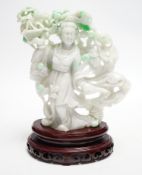 A Chinese jadeite figure of He Xiangu on carved stand, 17cm high
