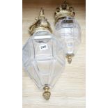 Two early 20th century gilt metal and art glass hall lanterns The small glass shade is badly damaged