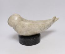 A Shona stone carving of a bird, possibly by Ignatius Zhakawayi, on a marble base, 35cm long