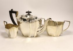 A Victorian/George V three piece silver tea set, Henry Wigful, Sheffield, 1898 & 1911, gross