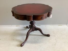 A Victorian style circular mahogany tripod centre table, with leather inset top, diameter 79cm,