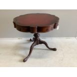 A Victorian style circular mahogany tripod centre table, with leather inset top, diameter 79cm,