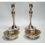 A pair of 19th century silver plated candlesticks and a pair of coasters, tallest 28cm