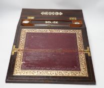 An early Victorian fret cut ivory inlaid rosewood writing slope with tooled leather slope, 35cm wide