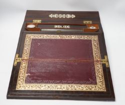 An early Victorian fret cut ivory inlaid rosewood writing slope with tooled leather slope, 35cm wide