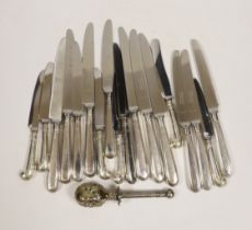 A set of six modern silver handled dessert knives and six table knives, Garrard & Co Sheffield,