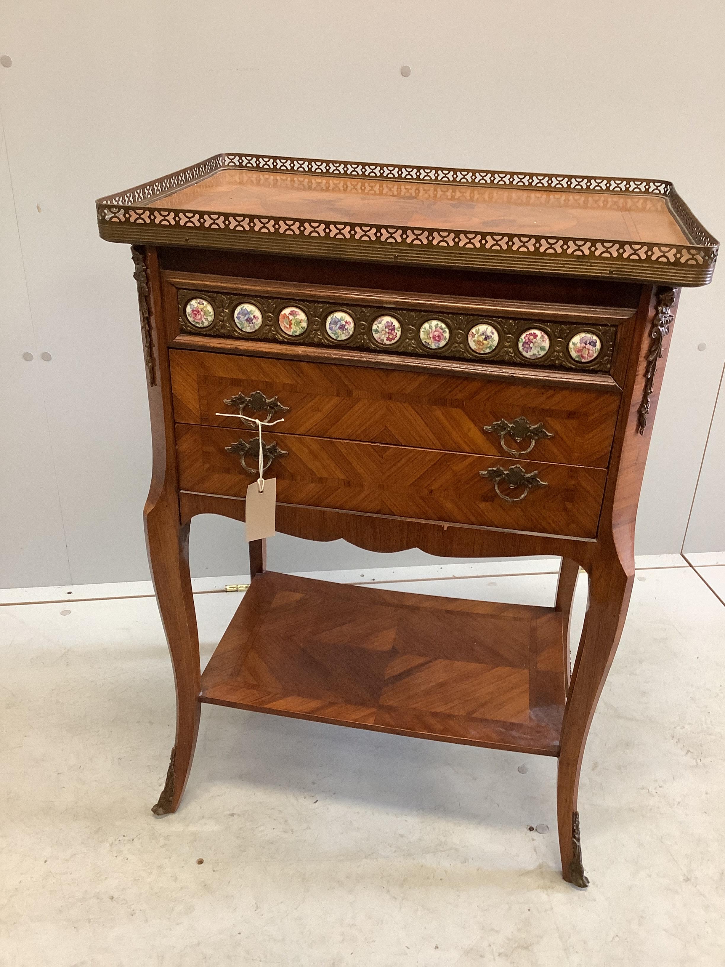 A Louis XVI style porcelain and gilt metal mounted inlaid kingwood two drawer chest, width 56cm,