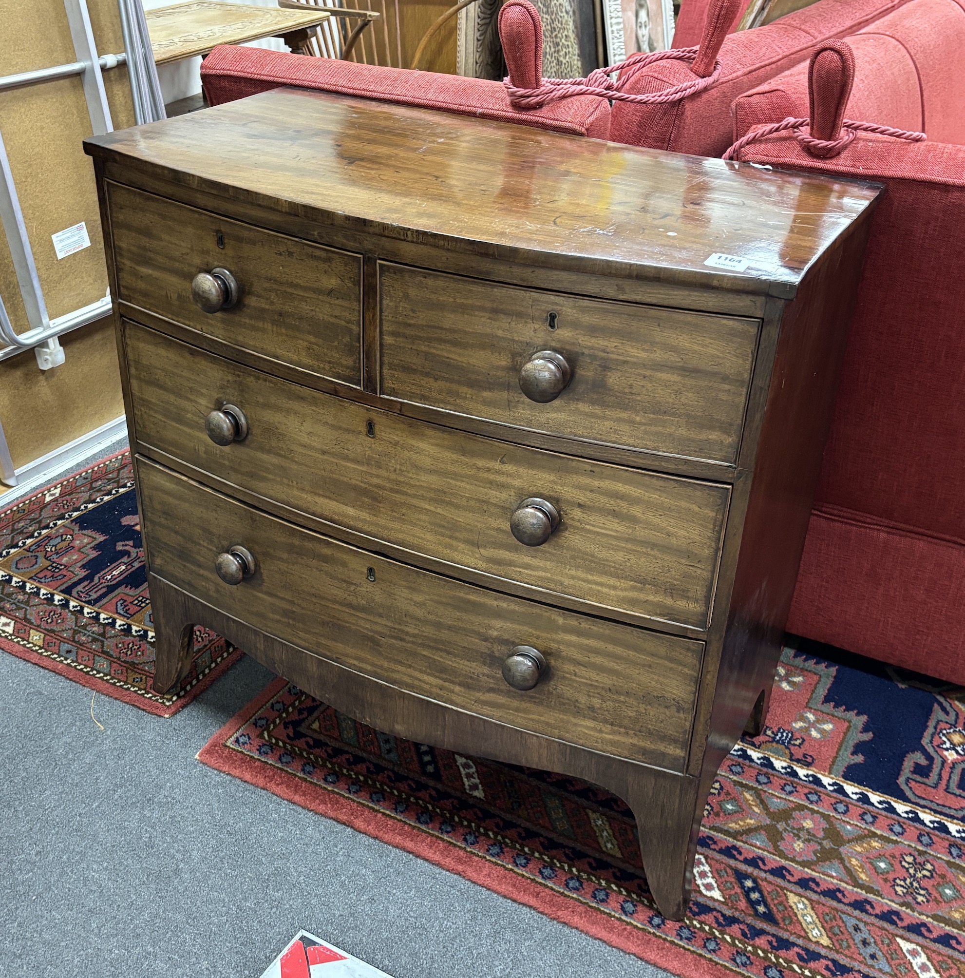 A Regency mahogany bowfront four drawer chest, width 91cm, depth 47cm, height 87cm