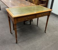 A Victorian satin walnut two drawer writing table, width 106cm, depth 53cm, height 75cm