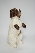 A 'Martel' pottery model of a dog, 33cm
