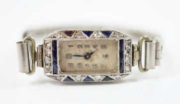 A lady's 1930's white metal (stamped platina), diamond and sapphire set manual wind cocktail