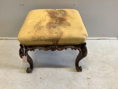 A Victorian carved mahogany dressing stool, width 56cm, depth 54cm, height 44cm