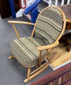 An Ercol elm and beech rocking chair, width 70cm, depth 78cm, height 85cm