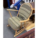 An Ercol elm and beech rocking chair, width 70cm, depth 78cm, height 85cm