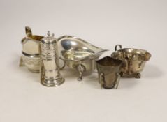 Small silverware, consisting:- a late Victorian helmet shaped cream jug, 1896; a George V oval sugar