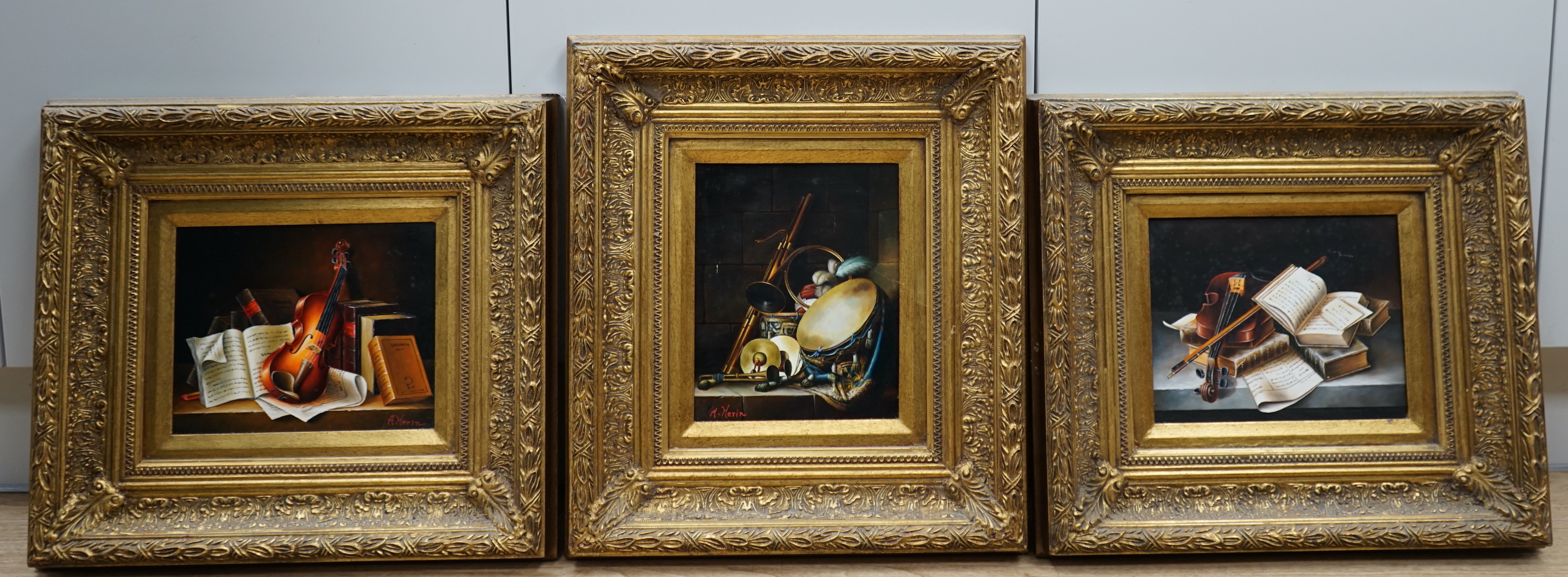 A Herin, set of three contemporary oils on board, Still lifes of musical instruments and sheet