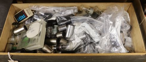 A quantity of microscope attachments, mainly lens pieces, in a wooden box