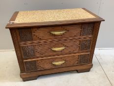 A French Art Deco carved oak three drawer chest with simulated marble top, width 105cm, depth