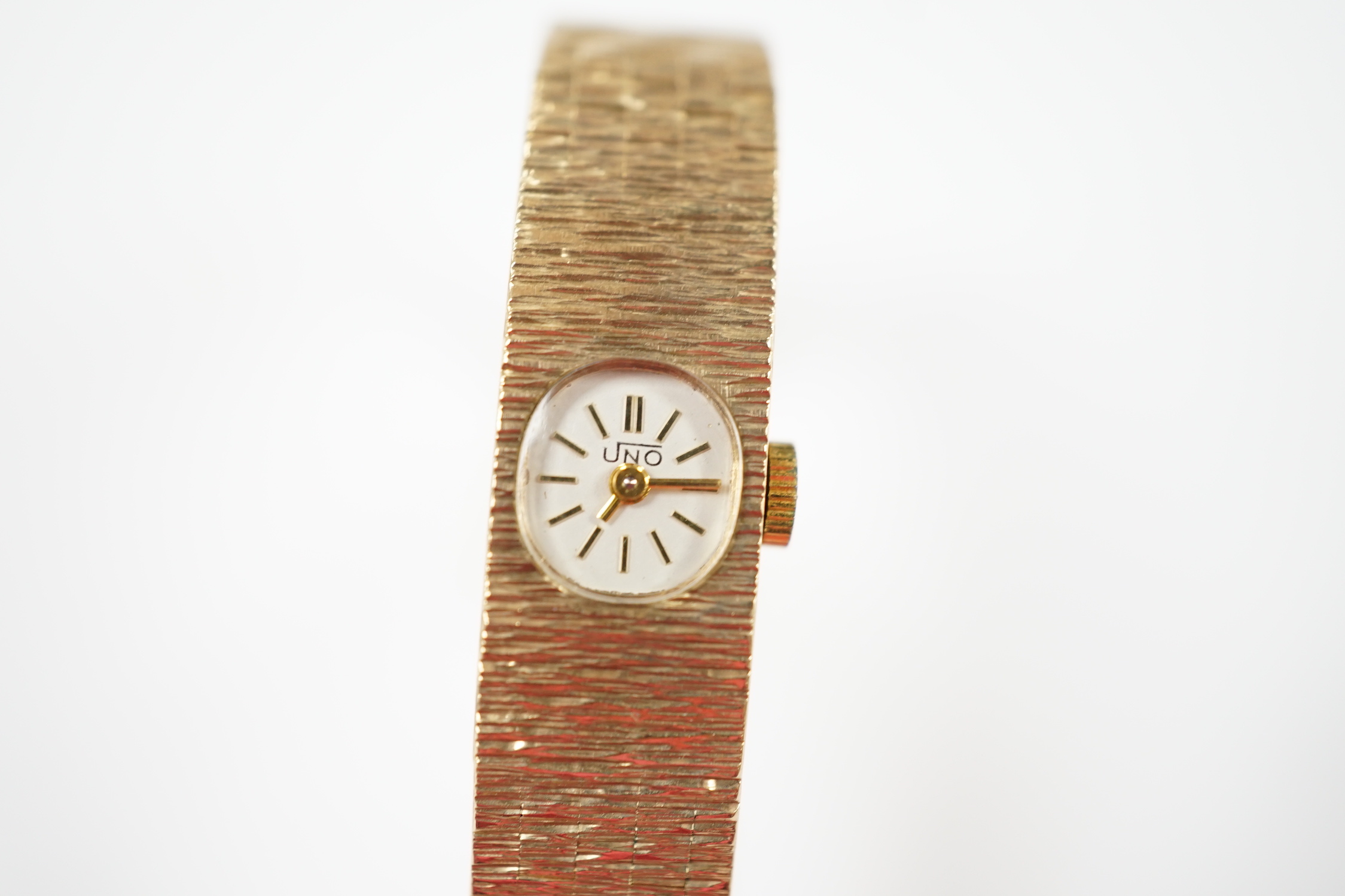 A lady's 1970's 9ct. gold Uno manual wind bracelet wrist watch with a bark textured bracelet, - Image 2 of 4