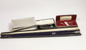An Elizabeth II silver mounted rectangular cigarette box, Birmingham, 1963, 17.4cm, a cased 1920's