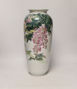 A boxed Chinese famille rose vase with wisteria decoration on hardwood stand, vase 43cm