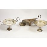 A pair of George V silver two handled fruit stands, Mappin & Webb, London, 1925, height 13.8cm and a