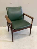 A mid century Danish Finnjuhl rosewood elbow chair, width 68cm, depth 50cm, height 80cm