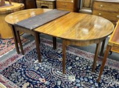 A George III mahogany D end extending dining table, 264cm extended, three spare leaves, width 121cm,